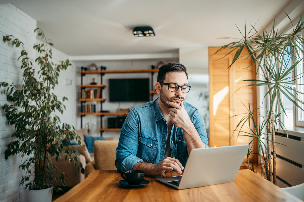 Man looking at laptop